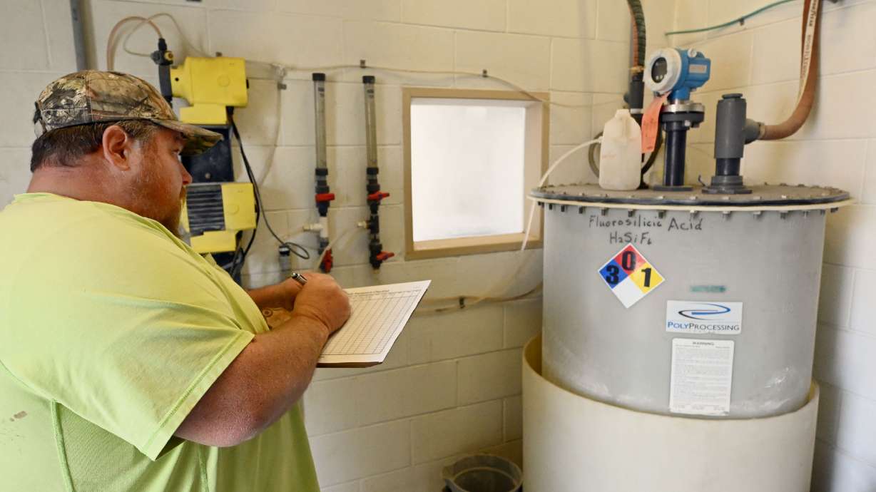 Weber Basin Water Conservancy District distribution operator Paul Spens checks fluoride levels in the water system at one of nine locations in Layton on March 31. Community water fluoridation will be prohibited in Utah beginning Wednesday, May 7.