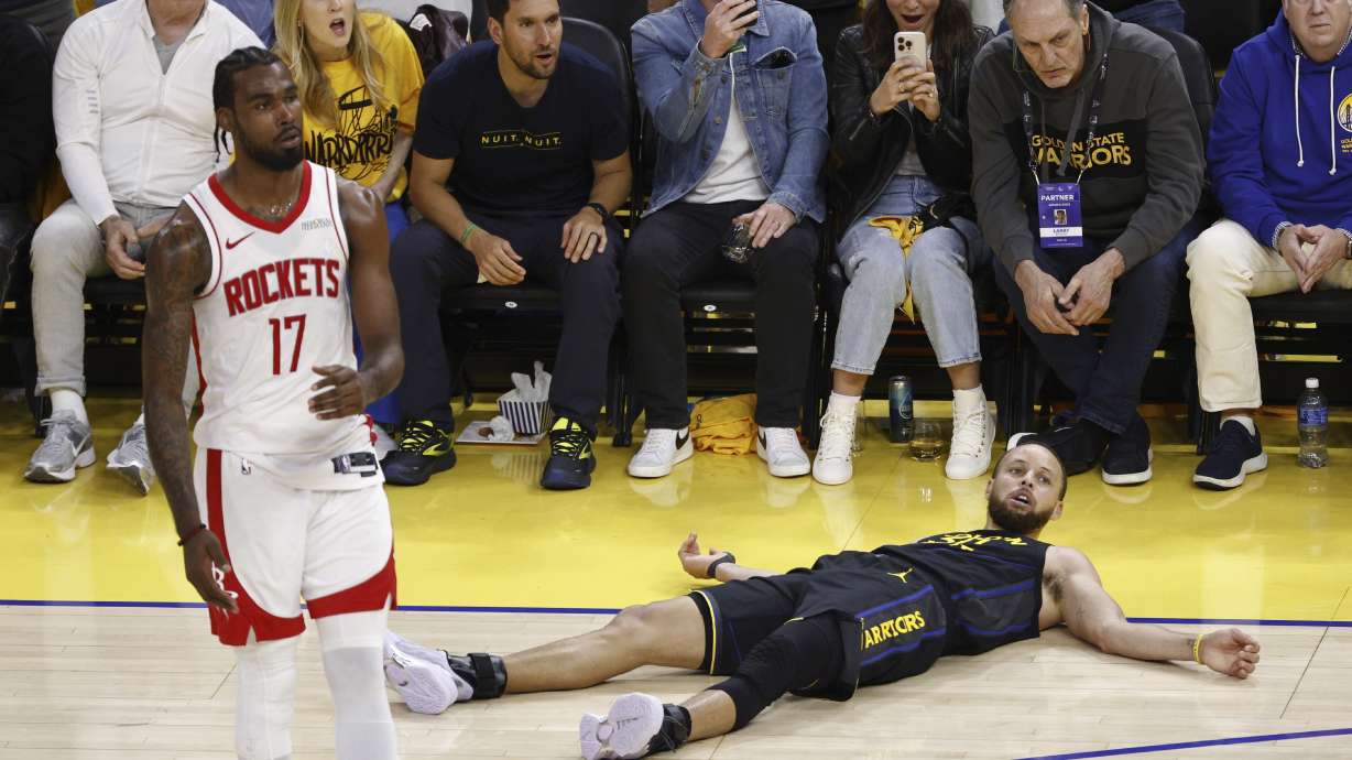 On his three-point attempt, Golden State Warriors guard Stephen Curry (30) is fouled by Houston Rockets forward Tari Eason (17) in the third quarter of Game 6 of an NBA basketball first-round playoff series Friday, May 2, 2025, in San Francisco.