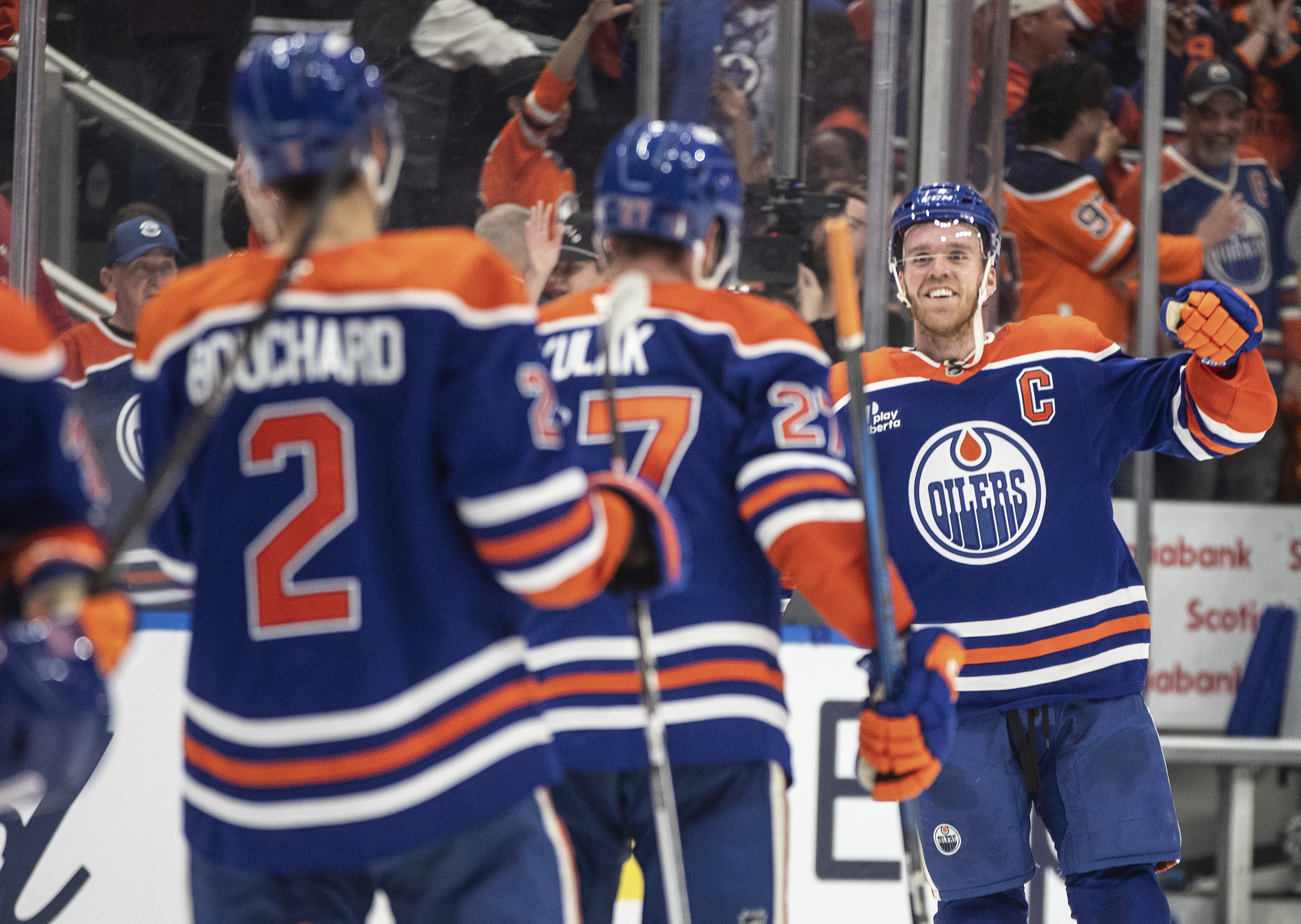 Edmonton Oilers' Connor McDavid (97) celebrates the win with teammates over the Los Angeles Kings during NHL playoff action in Edmonton on Thursday, May 1, 2025.