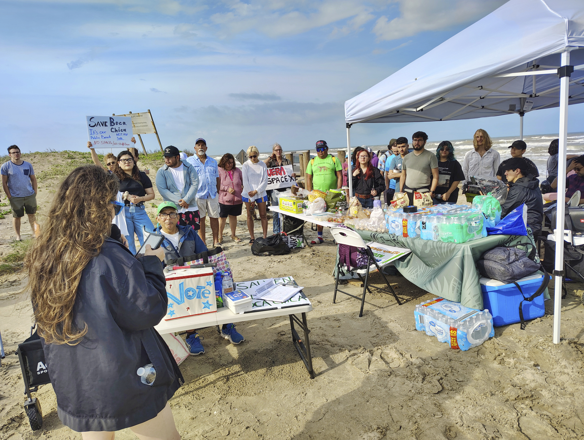 People protest at Boca Chica beach, Texas, on Saturday, before an incorporation election that would turn Starbase into an official Texas city.