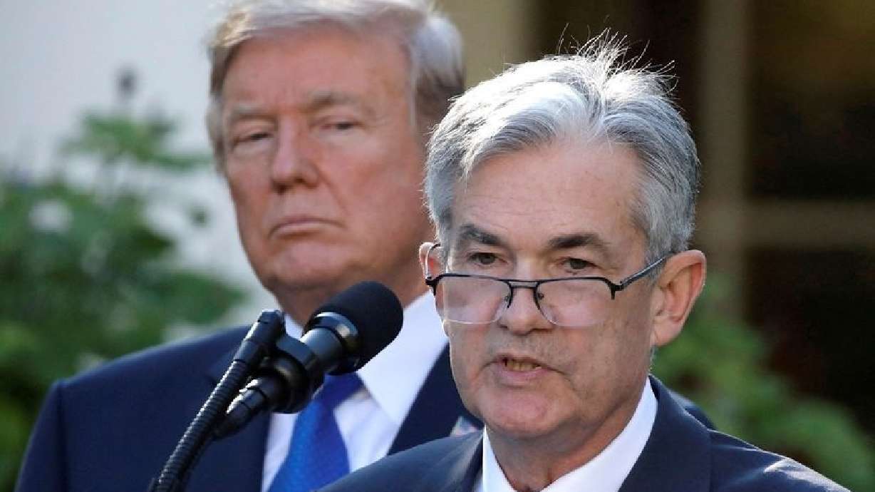President Donald Trump looks on as Jerome Powell speaks at the White House in Washington, Nov. 2, 2017. Trump said he will not remove Powell as Federal Reserve Board chairman.