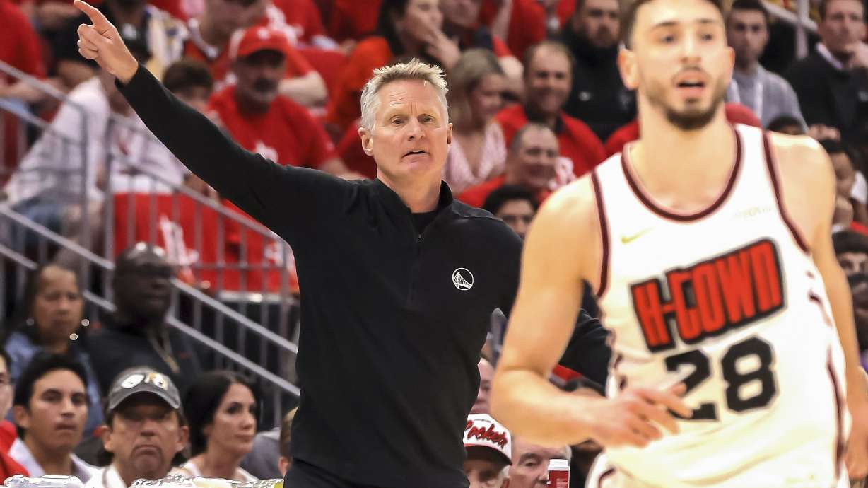 Golden State Warriors head coach Steve Kerr calls out to his players in the first half of Game 7 of an NBA basketball first-round playoff series against the Houston Rockets in Houston, Sunday, May 4, 2025.