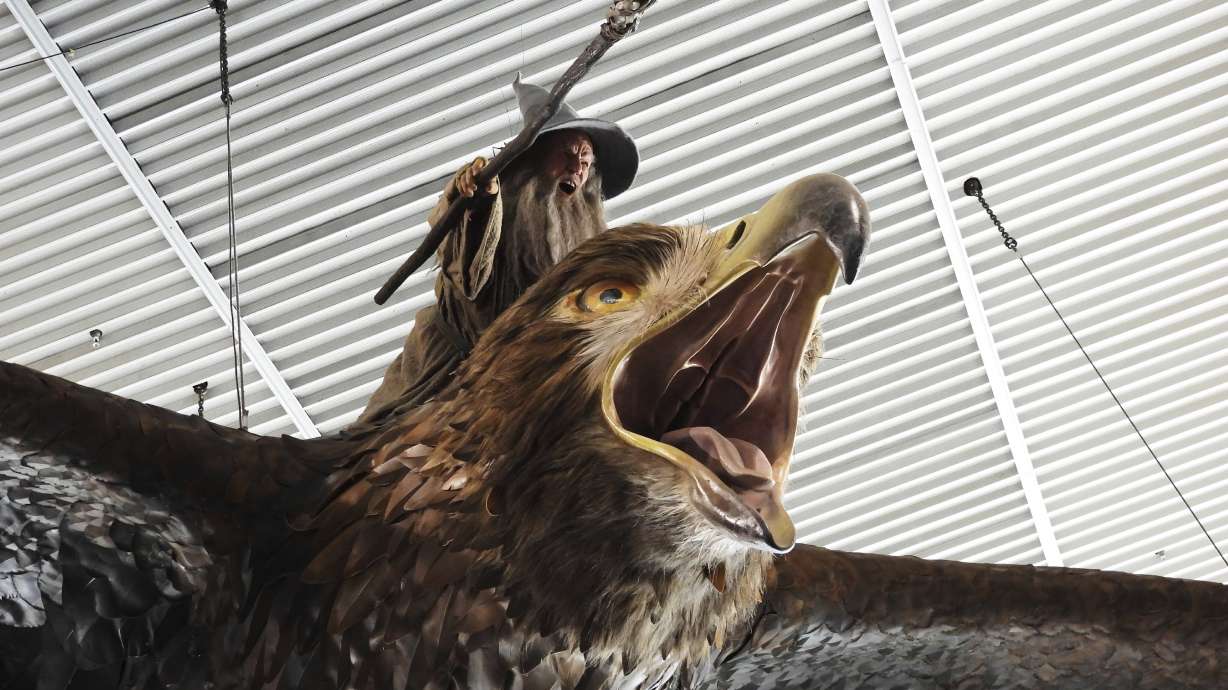 A sculpture of an eagle from the "Hobbit" films, ridden by the wizard Gandalf, hangs over the food court area of Wellington Airport, in Wellington, New Zealand, Monday.