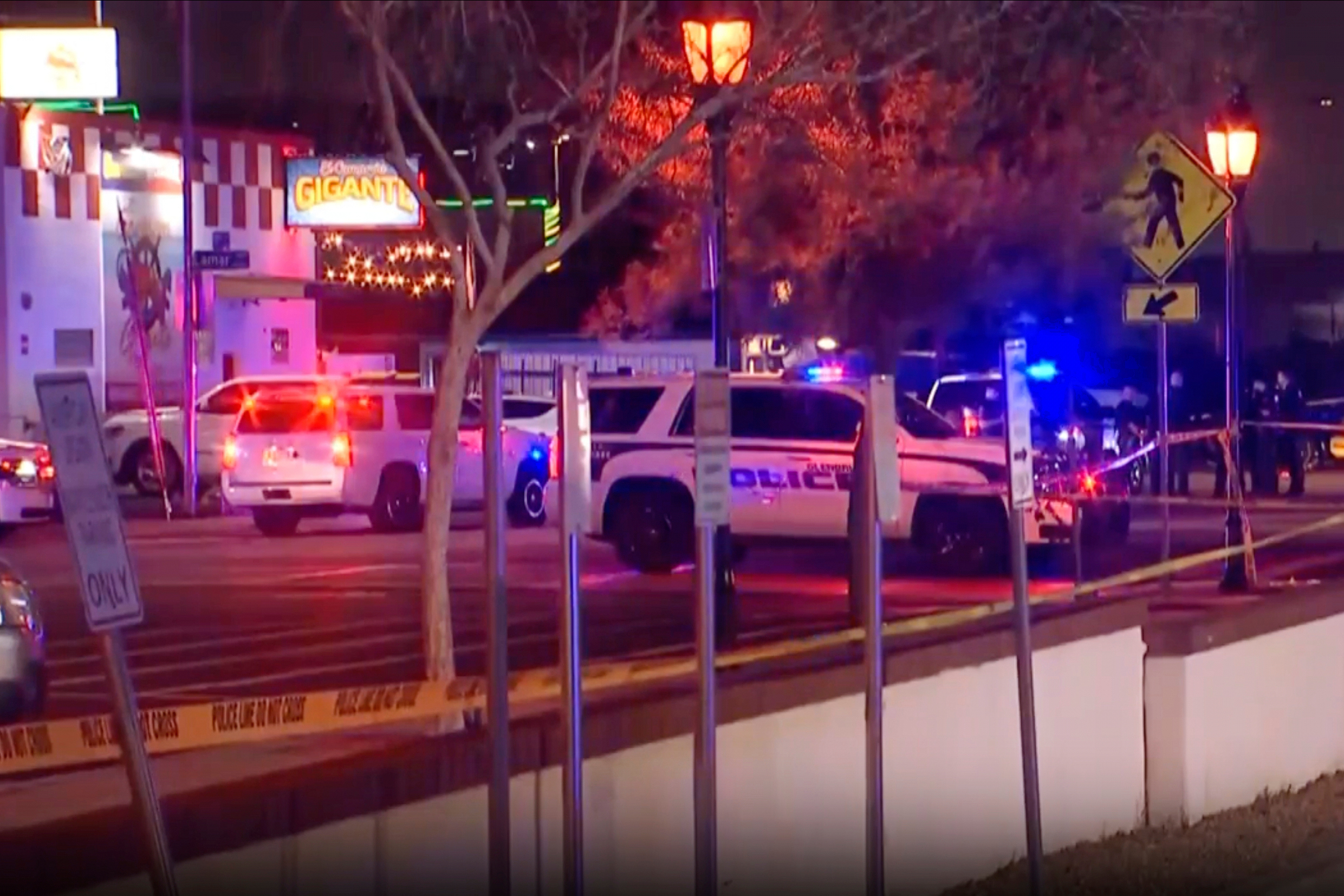 In this image made from video provided by AZFamily.com, first responders work the scene of a shooting in Glendale, a suburb of Phoenix on Sunday.