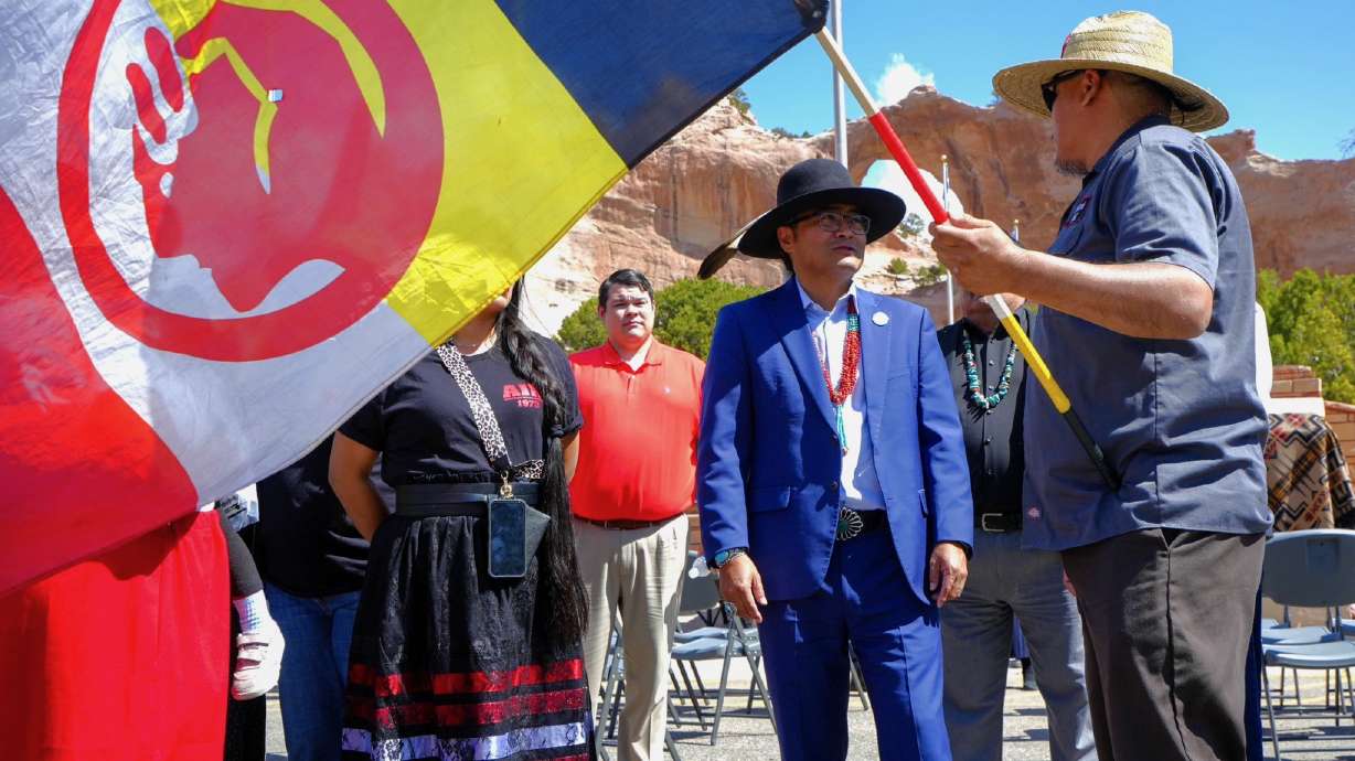 Navajo Nation President Buu Nygren, center, at the signing event in Window Rock, Arizona, on Friday for an executive order to bolster efforts to investigate cases of missing and murdered Indigenous people.