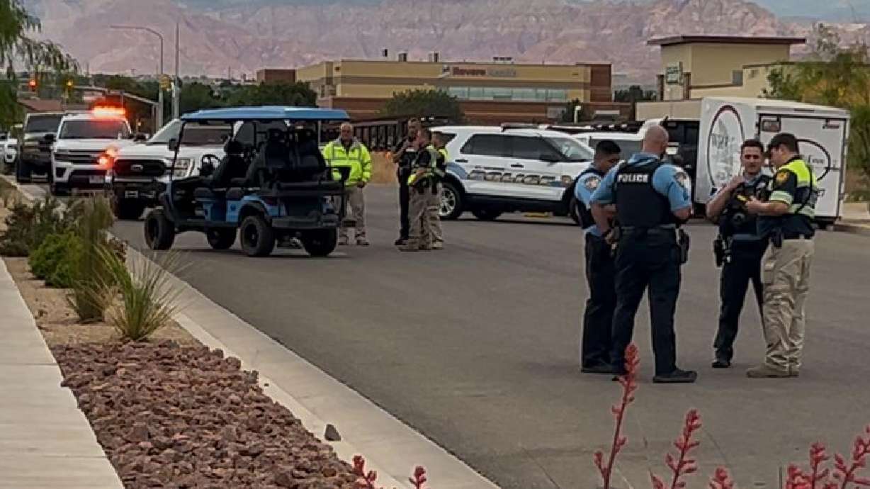 First responders investigate the scene of a collision in St. George on Sunday.