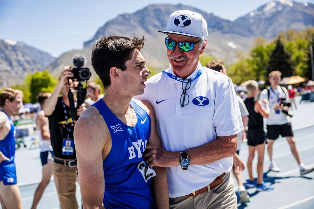 Carter Cutting, shown here with head coach Ed Eyestone, set a personal record with his 3:59.39 to win the mile and become the fifth runner in Utah history to run a sub-4 minute outdoor mile on day 3 of the Robison Invitational at BYU, Friday, May 2, 2025 in Provo, Utah.