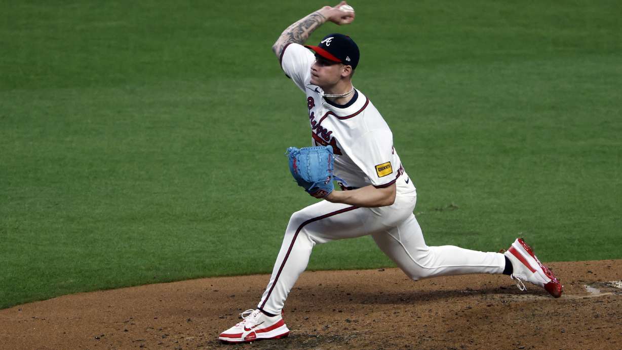 Atlanta Braves pitcher AJ Smith-Shawver throws during the seventh inning of a baseball game against the Cincinnati Reds, Monday, May 5, 2025, in Atlanta.