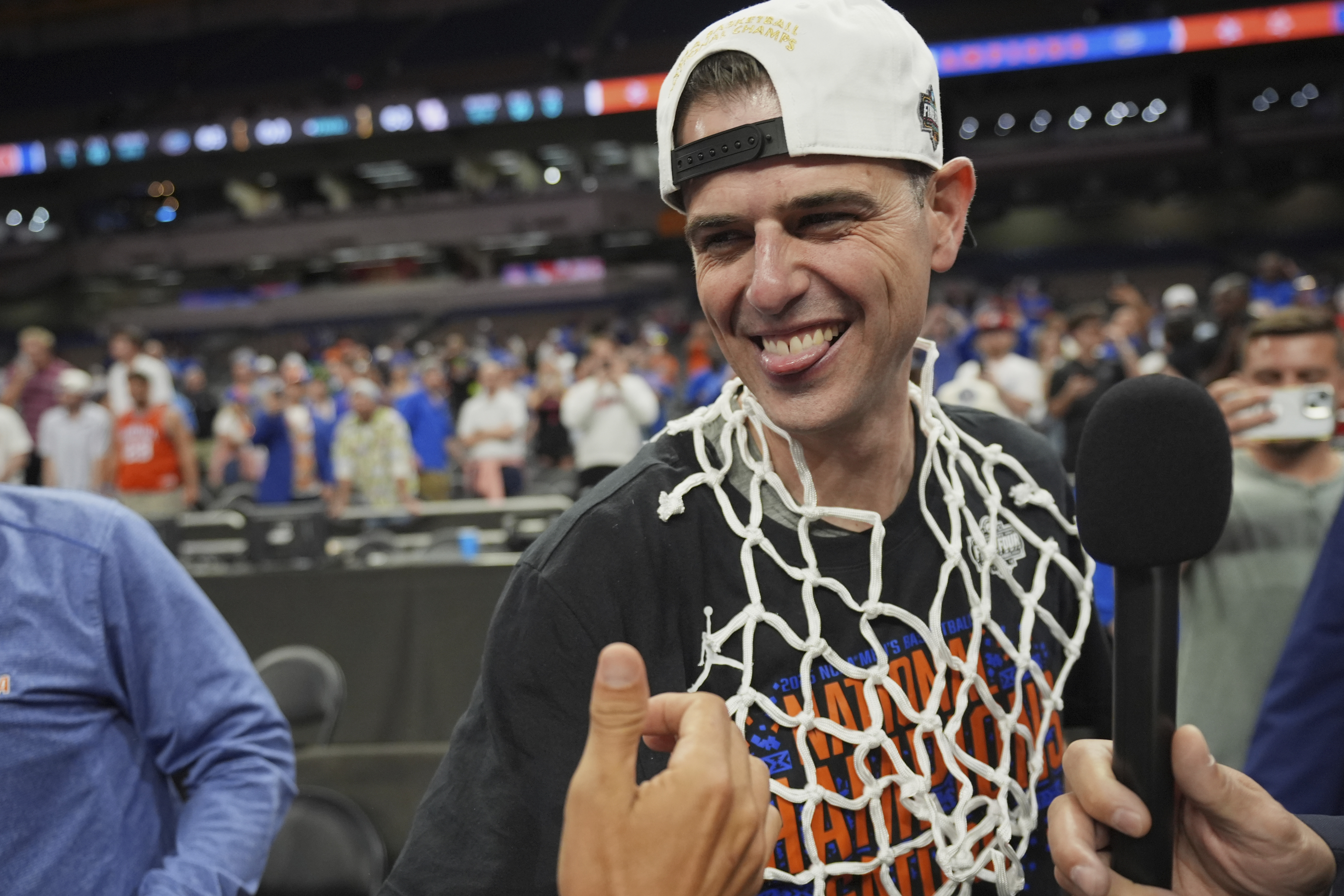 Florida head coach Todd Golden celebrates after Florida beat Houston in the national championship at the Final Four of the NCAA college basketball tournament, Monday, April 7, 2025, in San Antonio.