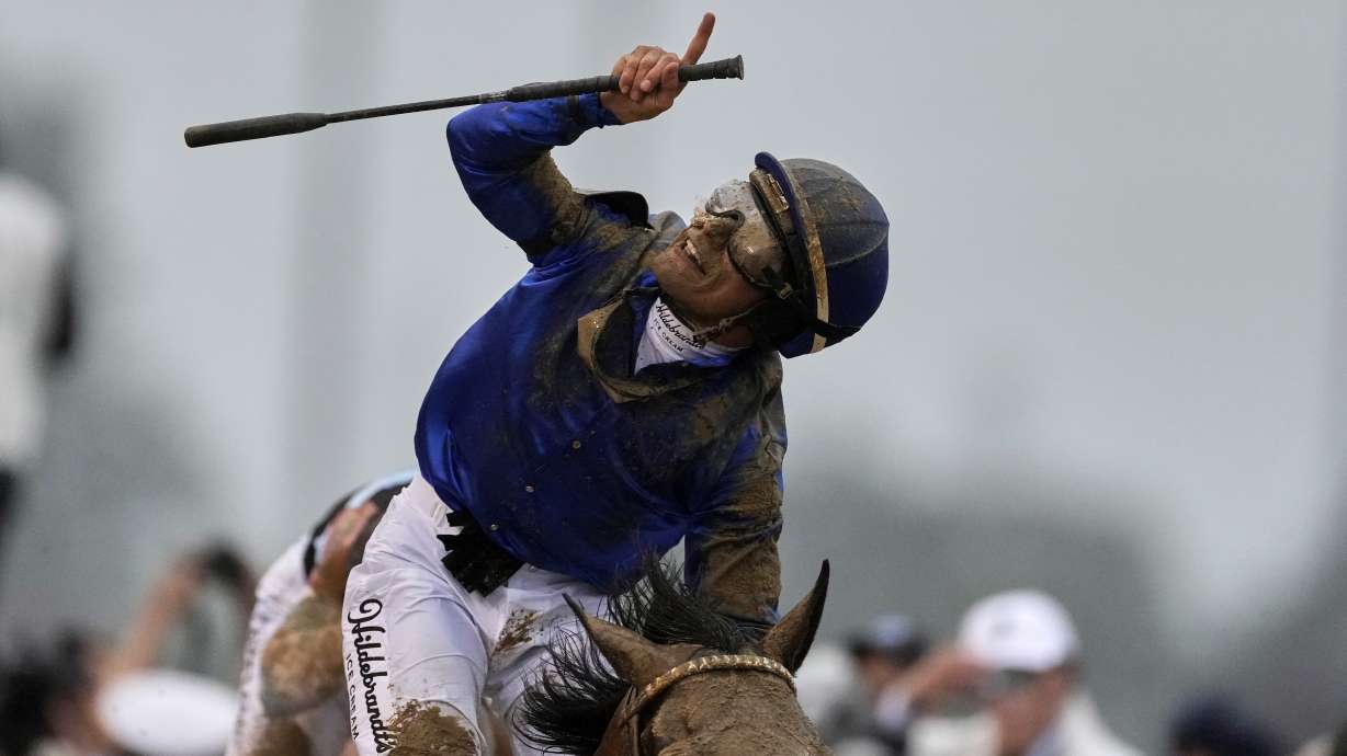 Jockey Junior Alvarado celebrates after riding Sovereignty to victory in the 151st running of the Kentucky Derby horse race at Churchill Downs Saturday, May 3, 2025, in Louisville, Ky.