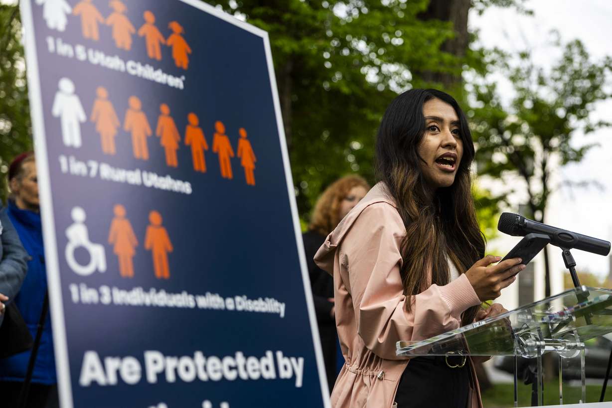 Ciriac Alvarez Valle, a senior policy analyst at Voices for Utah Children, speaks during a press conference by the newly launched Protect Medicaid Utah coalition that highlighted the impact potential cuts to Medicaid could have in Utah, at Pioneer Park in Salt Lake City on Tuesday.
