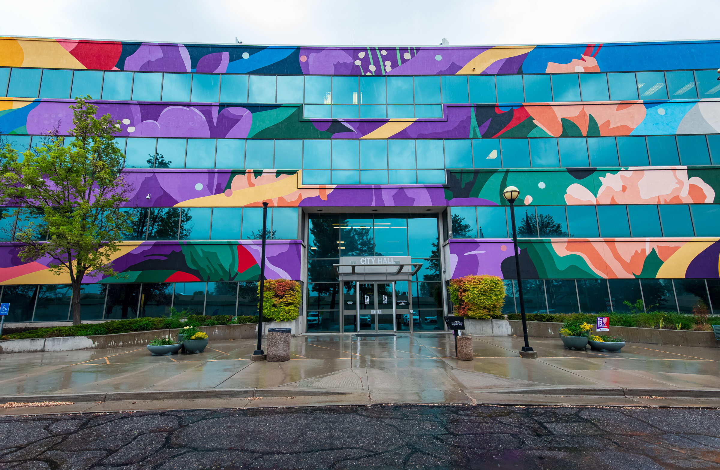 "Flourish," a mural by the artist DAAS, is pictured on the north side of South Salt Lake City Hall on Monday.