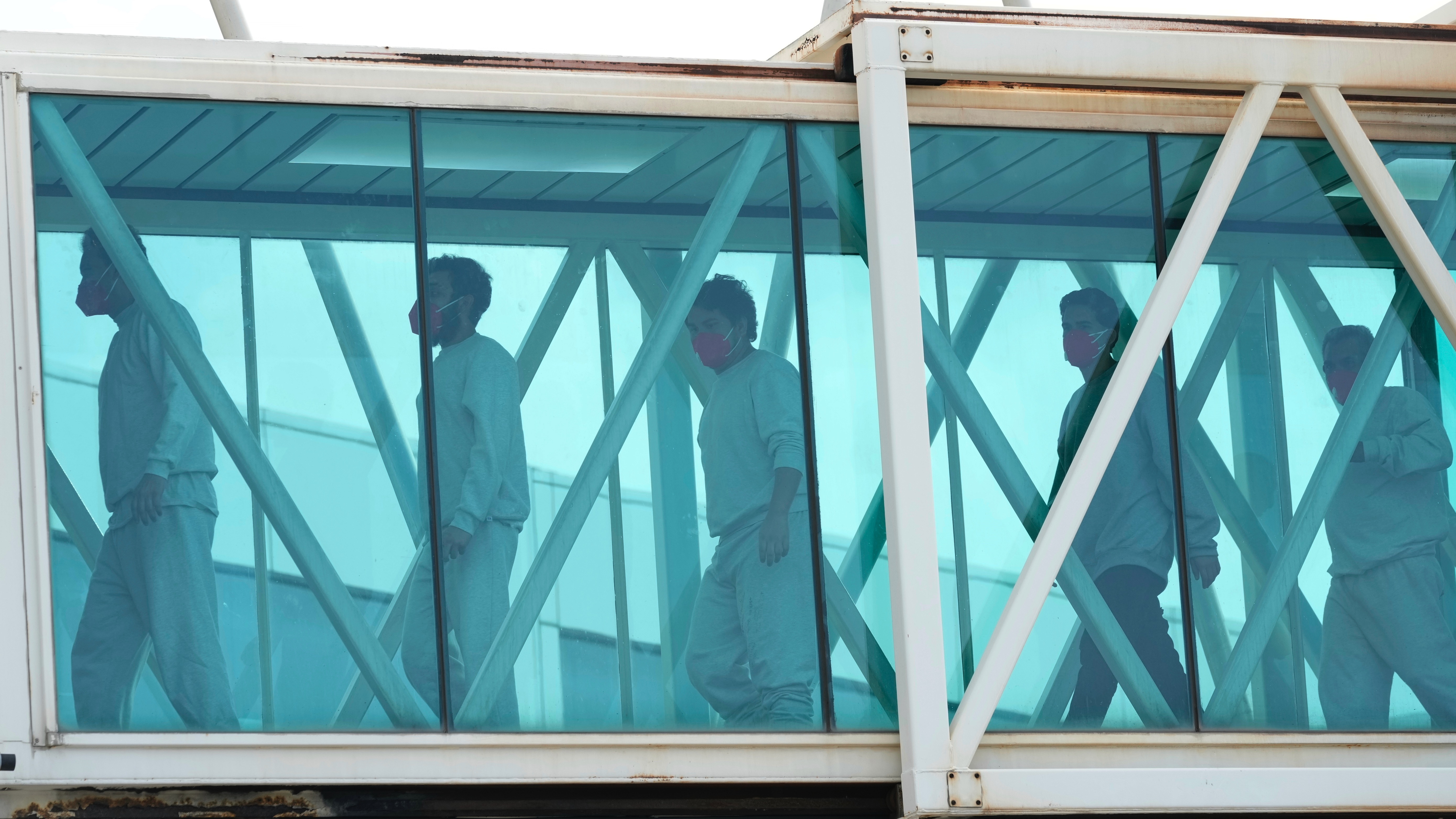 Hispanics in the United States worry more about deportation than others, a survey shows. Venezuelan migrants deported from the United States deplane at the Simon Bolivar International Airport in Maiquetia, Venezuela, on Friday.