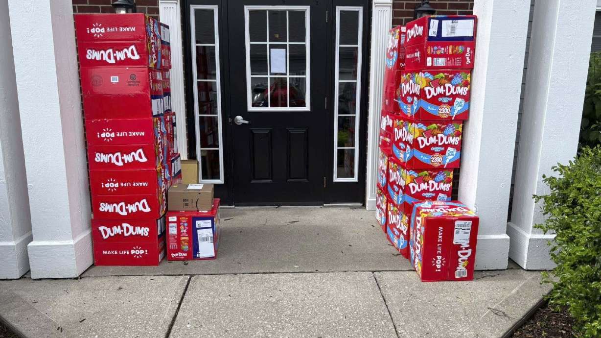 Boxes of Dum-Dum lollipops outside of Holly LaFavers's home Monday in Lexington, Ky.