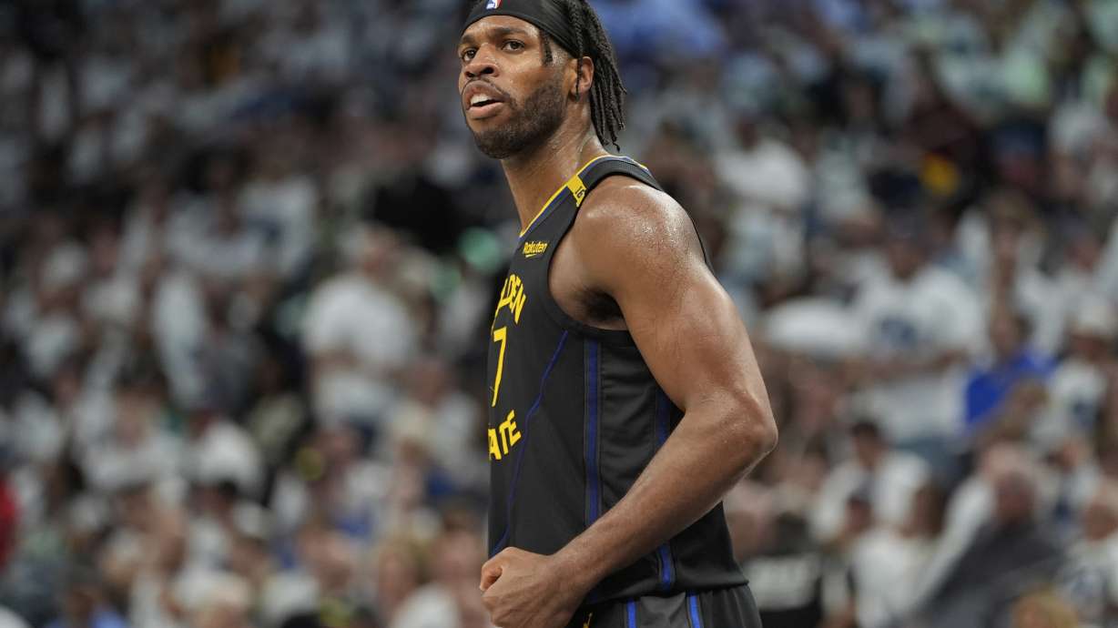 Golden State Warriors guard Buddy Hield (7) celebrates during the second half of Game 1 of an NBA basketball second-round playoff series against the Minnesota Timberwolves, Tuesday, May 6, 2025, in Minneapolis.
