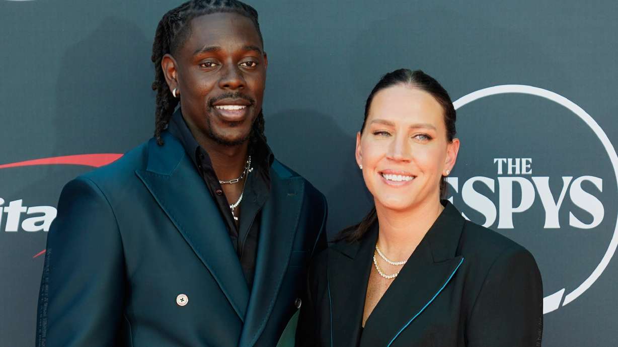 FILE - NBA basketball player Jrue Holiday, left, and former professional soccer player Lauren Holiday arrive at the ESPY awards on Wednesday, July 12, 2023, at the Dolby Theatre in Los Angeles.