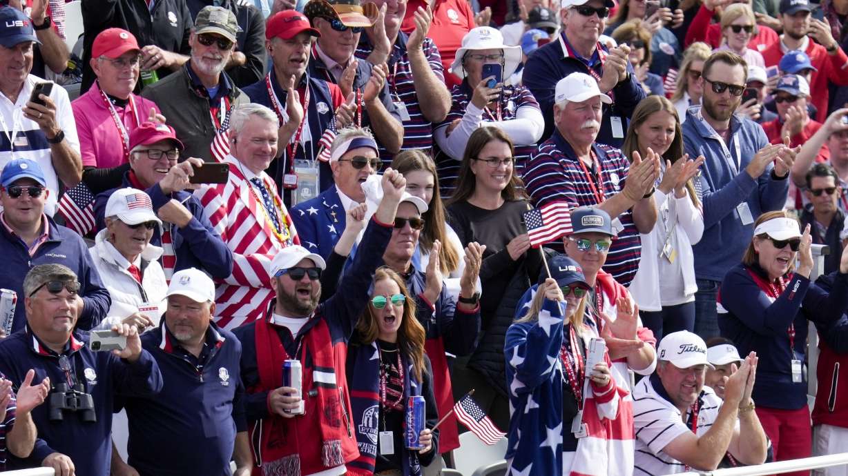 FILE - Fans cheer on the first tee during a singles match the Ryder Cup golf matches at the Whistling Straits Golf Course, Sunday, Sept. 26, 2021, in Sheboygan, Wis.