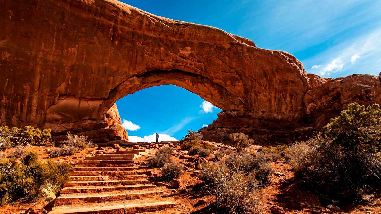 The National Park Service said a man died Tuesday while hiking along the Windows Loop Trail at Arches National Park near Moab. The undated photo shows North Window near the start of the trail.