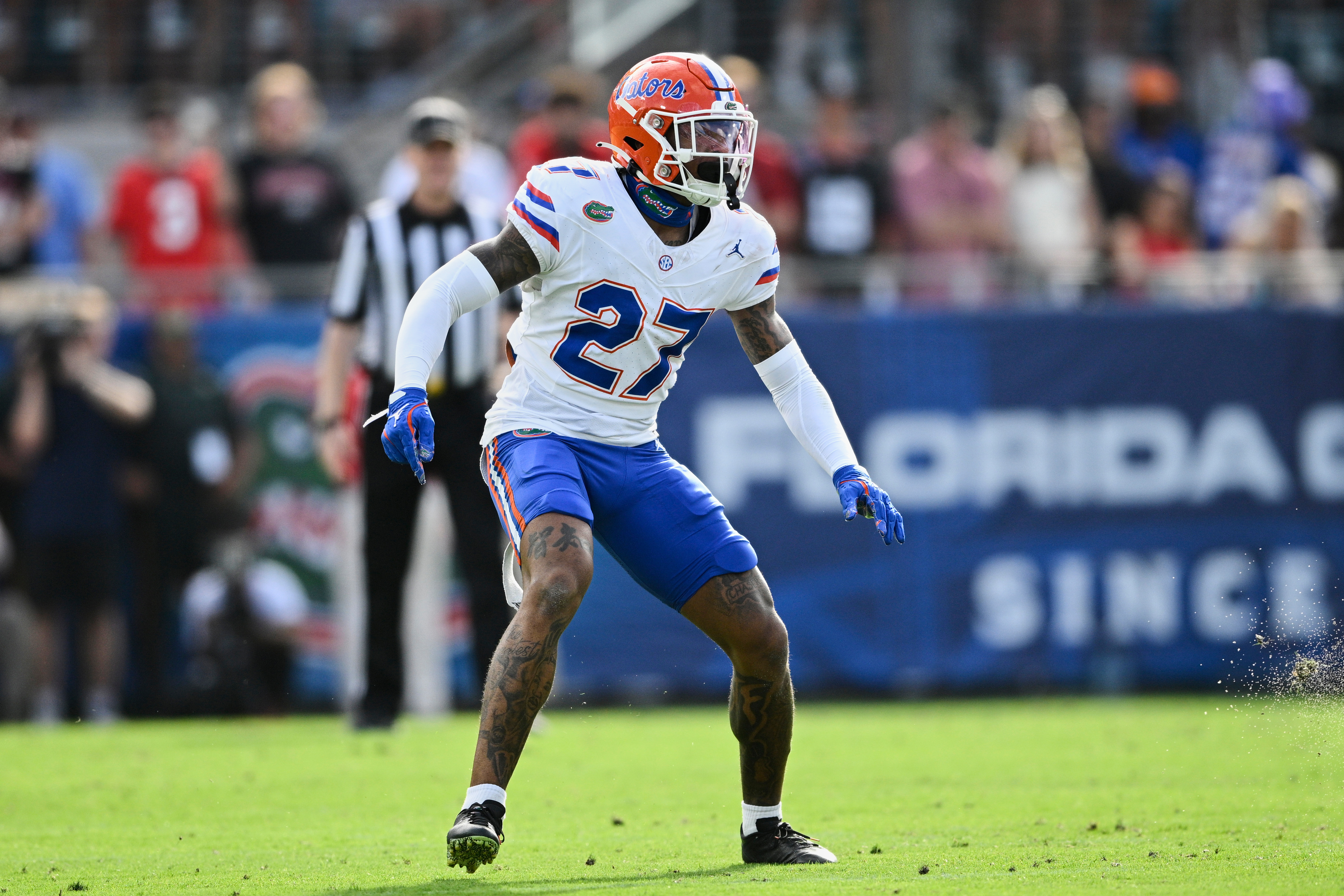 FILE - Florida defensive back Dijon Johnson (27) follows a play against Georgia during the first half of an NCAA college football game, Saturday, Nov. 2, 2024, in Jacksonville, Fla.