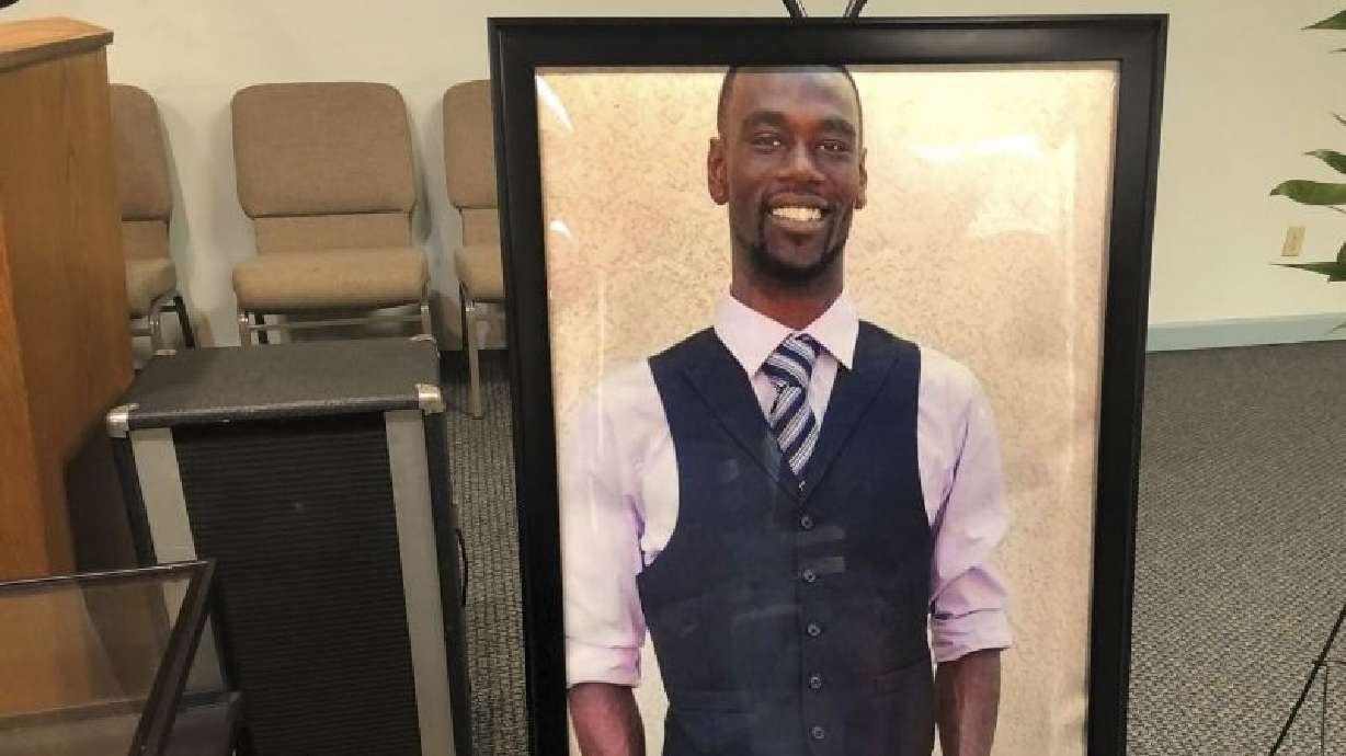 A portrait of Tyre Nichols is displayed at a memorial service for him on Jan. 17, 2023 in Memphis, Tenn. Three former Memphis officers have been acquitted of state charges in Nicols's death.