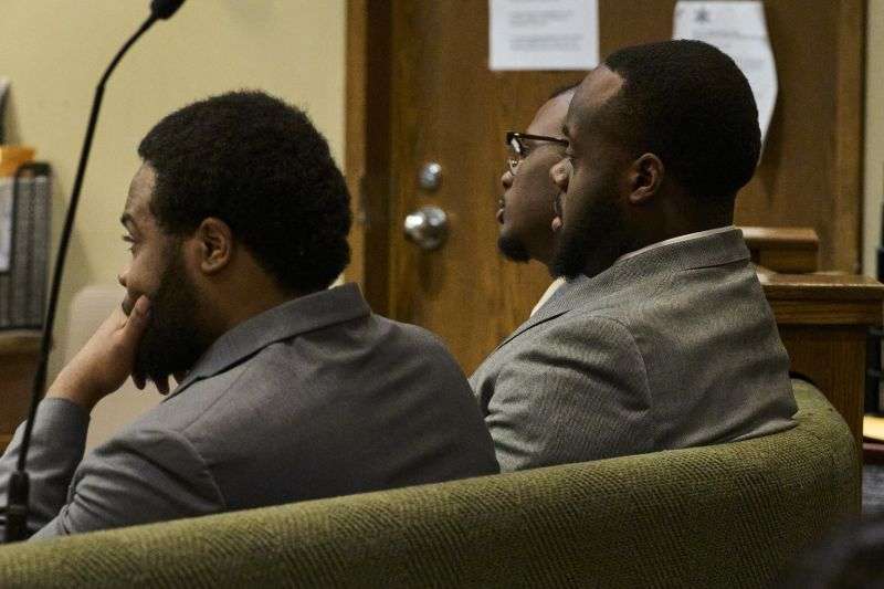 Demetrius Haley, left, Tadarrius Bean, and Justin Smith, Jr., rear, three former Memphis Police Department officers charged with fatally beating Tyre Nichols in 2023, sit in the courtroom during their trial, Tuesday, in Memphis, Tenn.