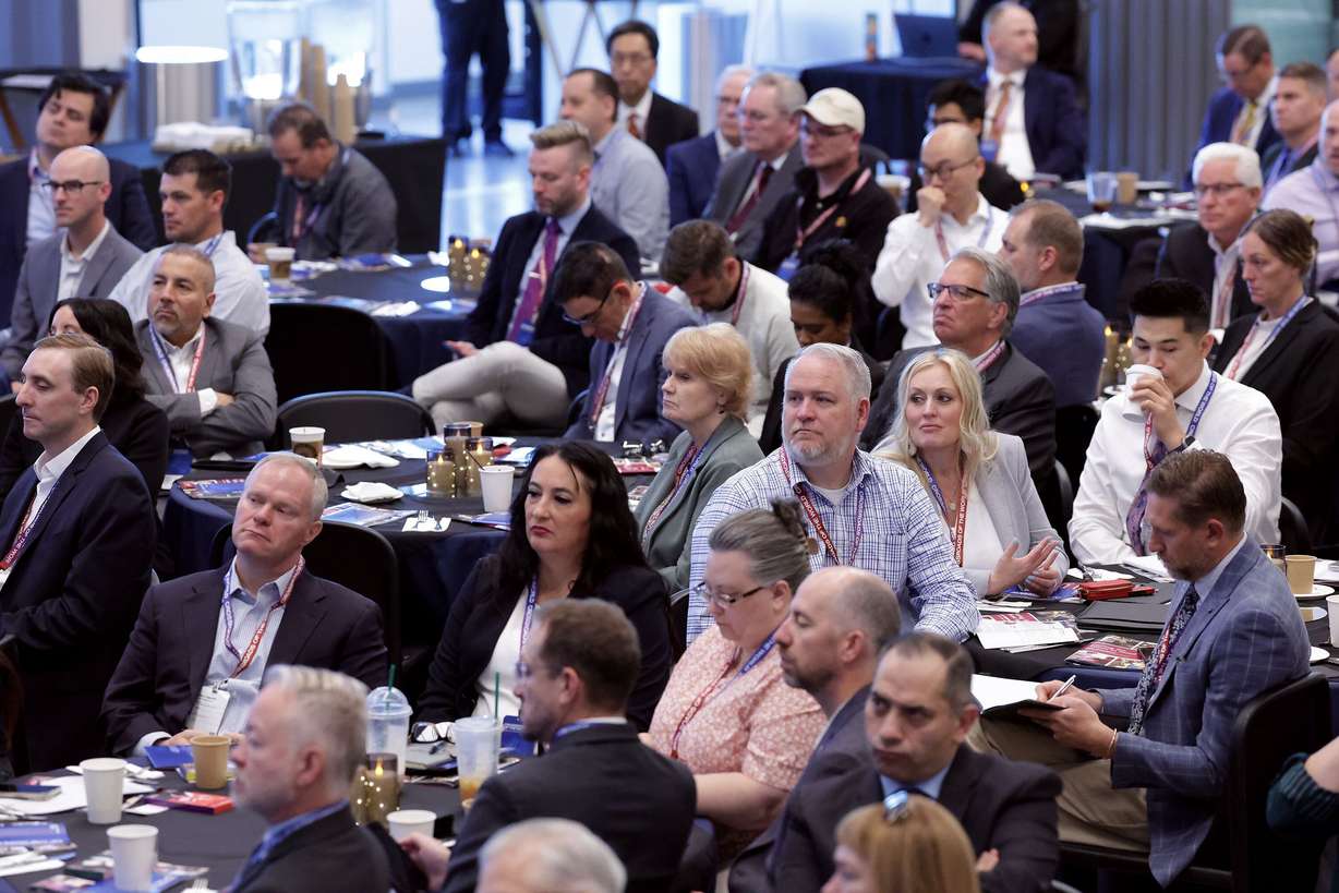 People attend Crossroads of the World International Trade Summit at Zions Bancorporation’s Technology Center in Midvale on Wednesday.