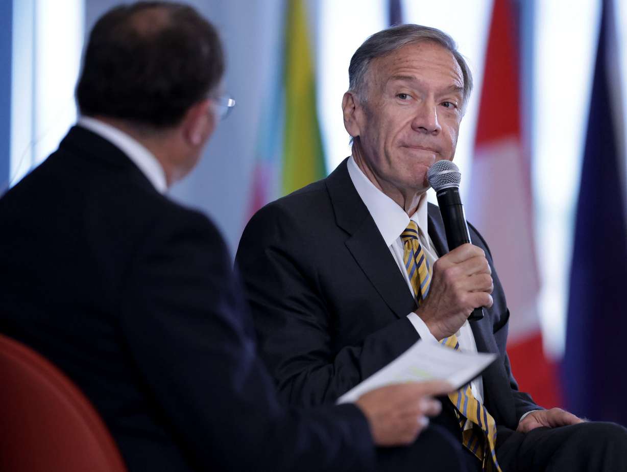 Former Secretary of State Mike Pompeo, right, answers a question posed by former Utah Gov. Gary Herbert, left, at Crossroads of the World International Trade Summit at Zions Bancorporation’s Technology Center in Midvale on Wednesday.