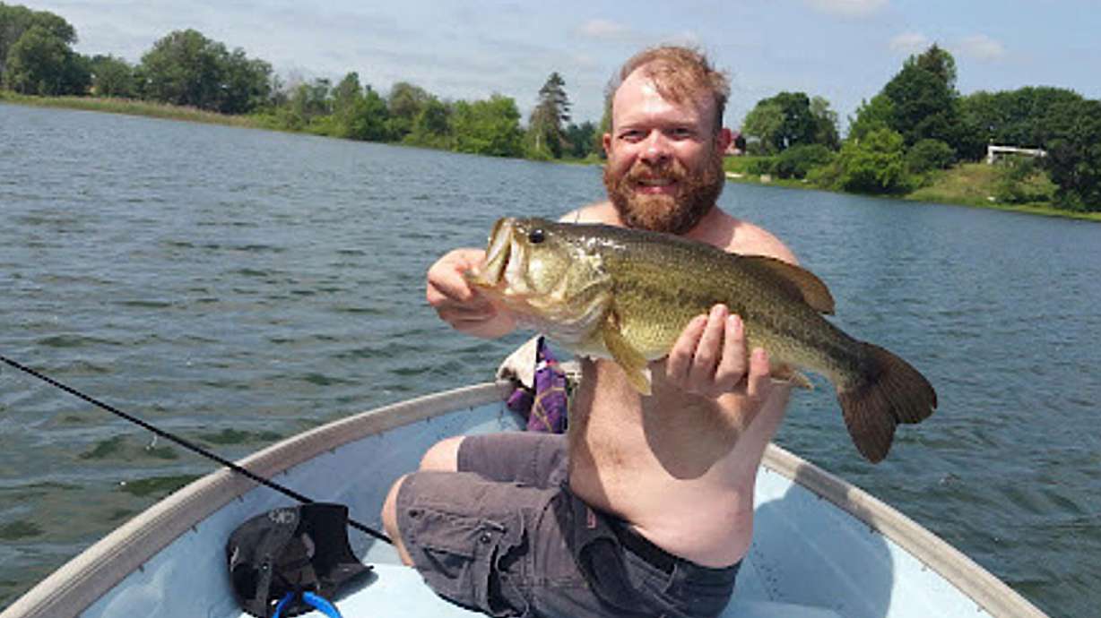 Chris Pelkey with a fish at Crystal Lake in Coram, N.Y. Artificial intelligence was used to allow Pelkey, who was fatally shot in a road-rage incident, to have a voice in a victim impact statement.