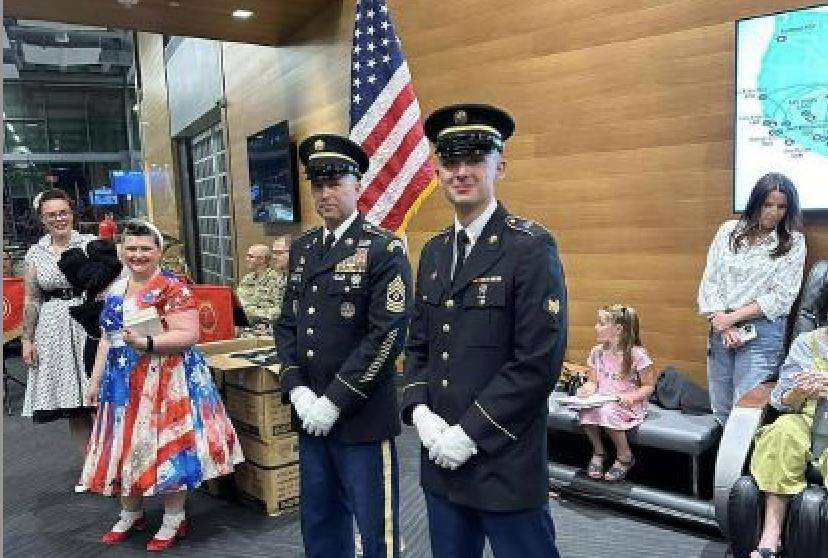 U.S. Army Sgt. 1st Class Corey Bybee and his team wait to welcome back veterans from the Utah Honor Flight.