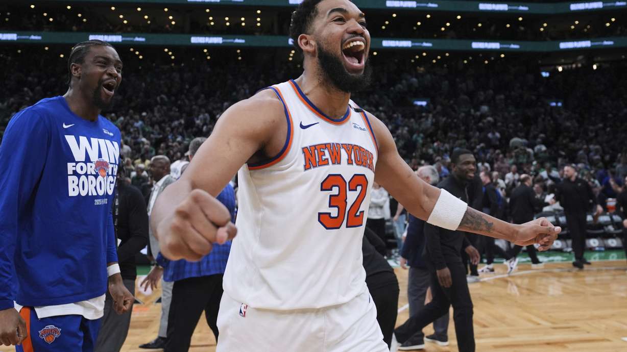 New York Knicks center Karl-Anthony Towns (32) celebrates after defeating the Boston Celtics in Game 2 of an NBA basketball second-round playoff series Wednesday, May 7, 2025, in Boston.