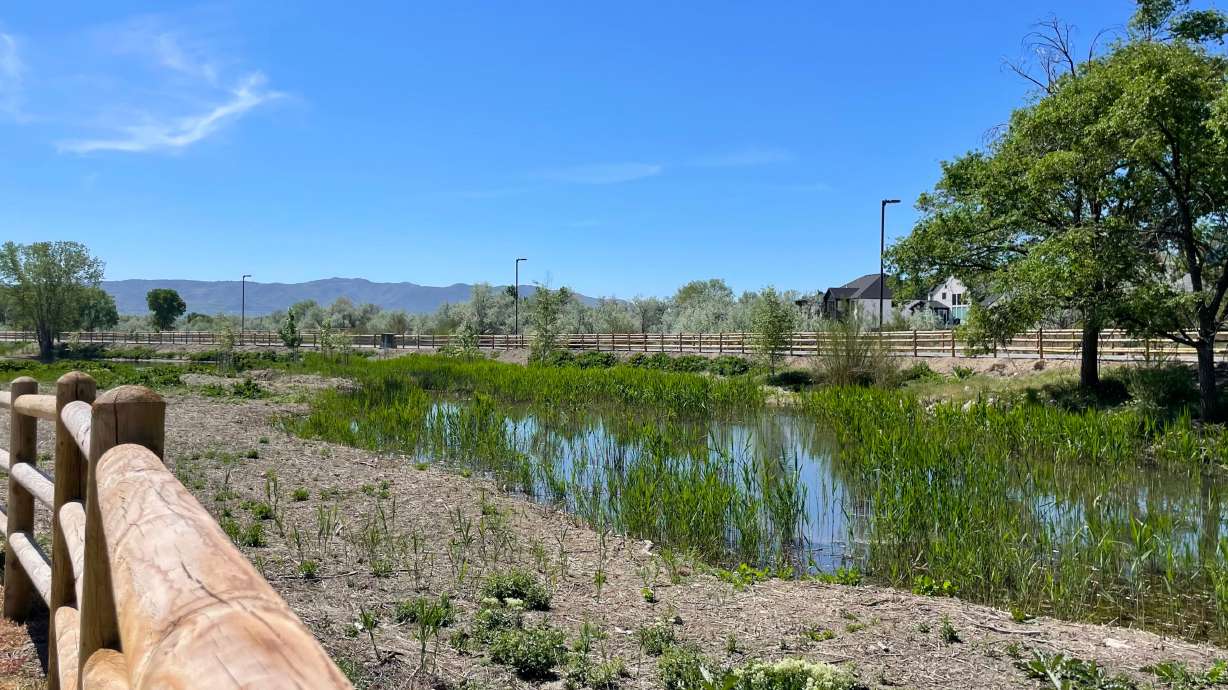 Sandy city officials on Thursday dedicated a new wetlands park area next to Grandpa's Fish Pond after seven years of planning and development.