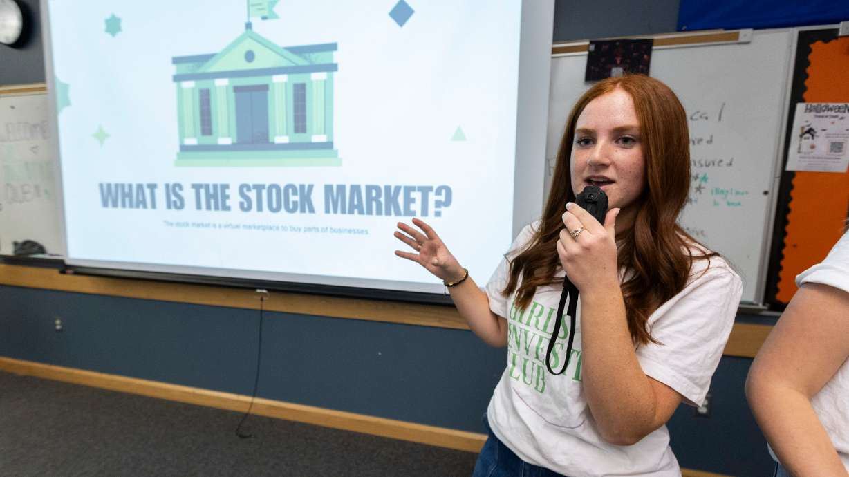 Junior Baylee Zuniga, founder and co-president of the Girls Investing Club, teaches about the stock market at Herriman High School in Herriman on Oct. 18, 2024. Zuniga said her parents have always taught her about financial literacy.