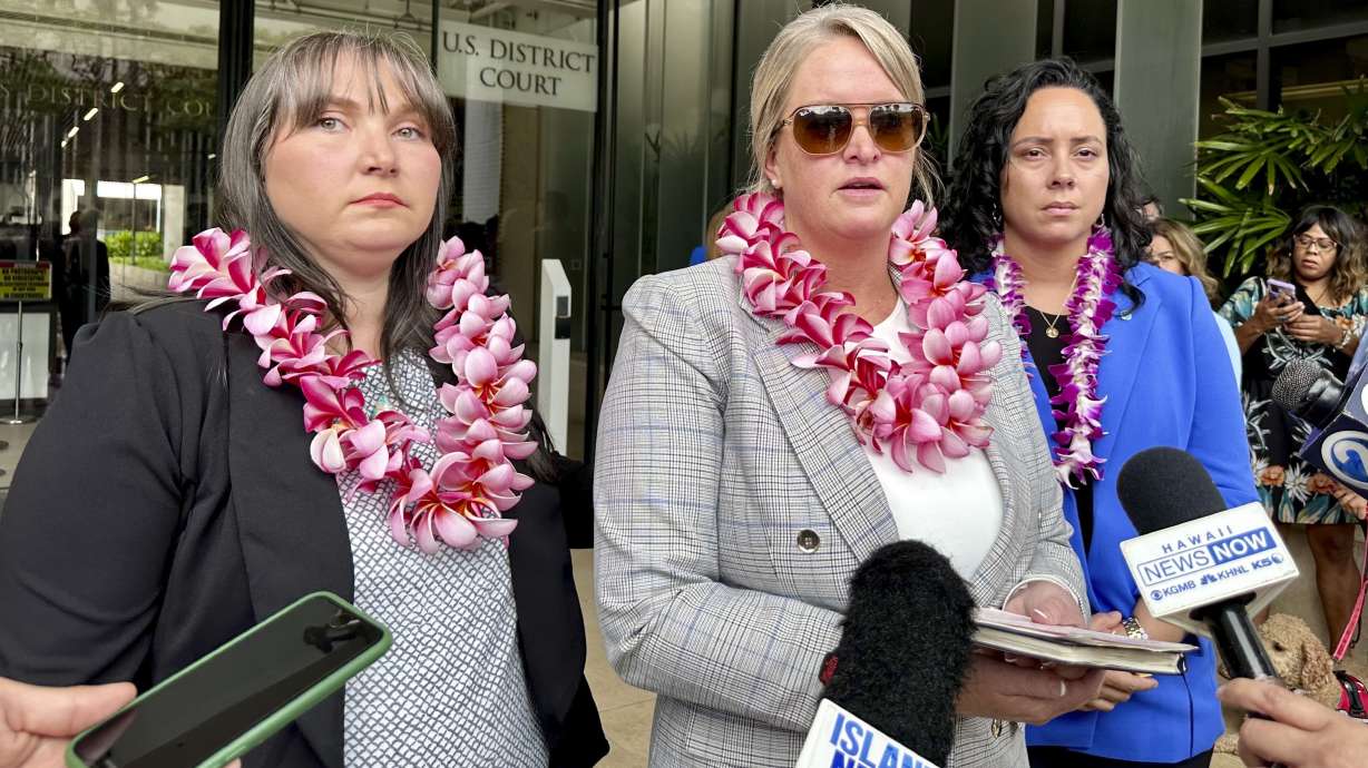 Richelle Dietz, Amanda Feindt and Nastasia Freeman speak at the end of a trial on May 13, 2024, in Honolulu. A federal judge awarded payments to families who say they were sickened by a 2021 jet fuel leak from Red Hill in Hawaii.