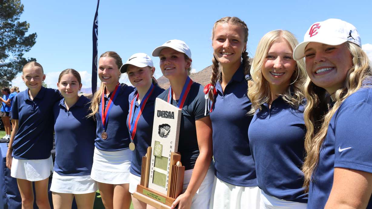 Crimson Cliffs celebrates winning the title during the 4A girls golf state tournament, Thursday, May 8, 2025 at Southgate GC in St. George.