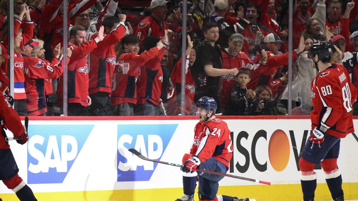 Washington Capitals center Connor McMichael (24) celebrates his goal in the second period of Game 2 of a second-round NHL hockey playoff series against the Carolina Hurricanes Thursday, May 8, 2025, in Washington.