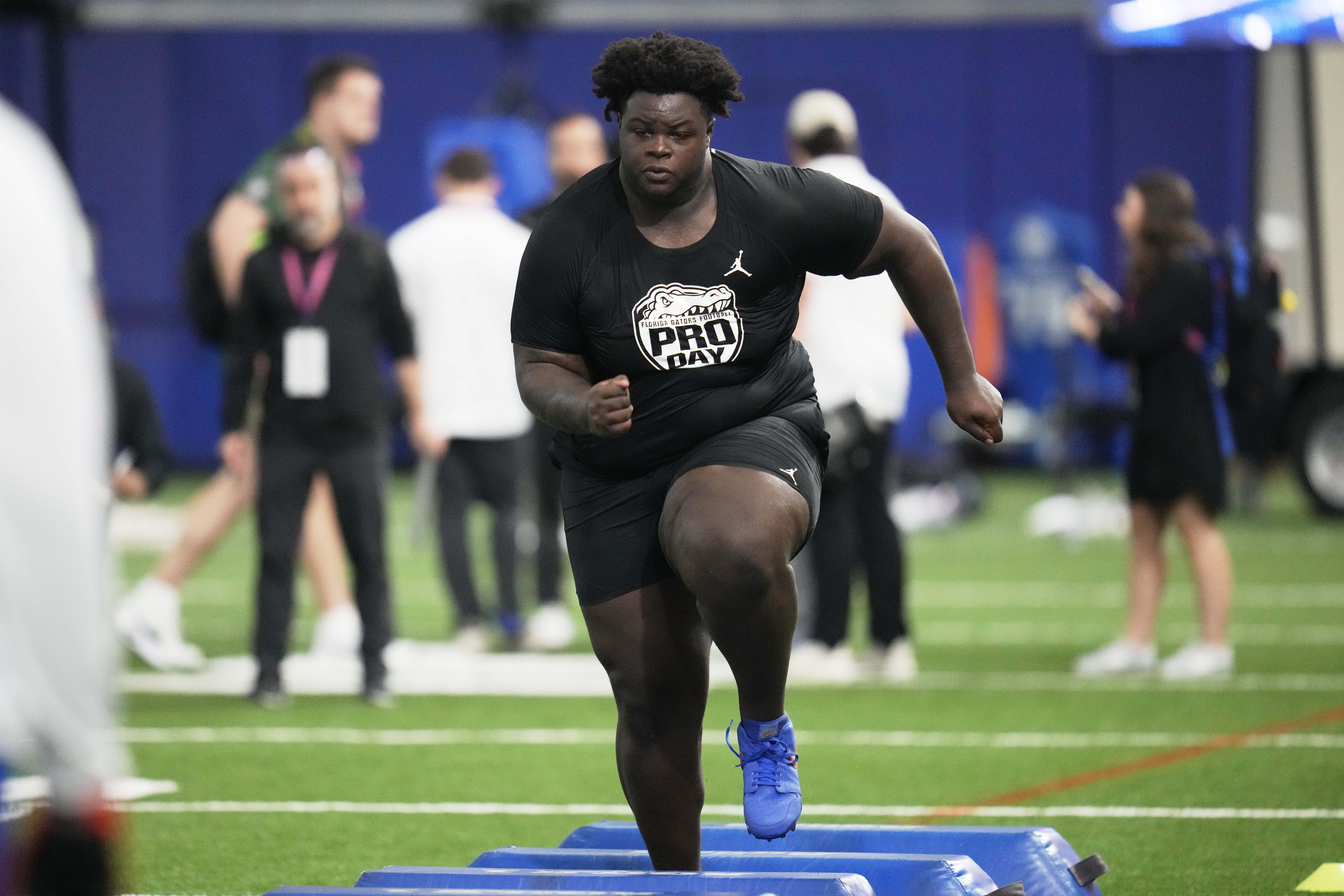 FILE - Florida defensive lineman Desmond Watson runs through a drill during the school's NFL football pro day, March 27, 2025, in Gainesville, Fla.