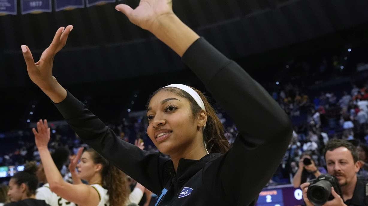 Chicago Sky forward Angel Reese responds to the crowd after a WNBA exhibition basketball game against Brazil in Baton Rouge, La., Friday, May 2, 2025.