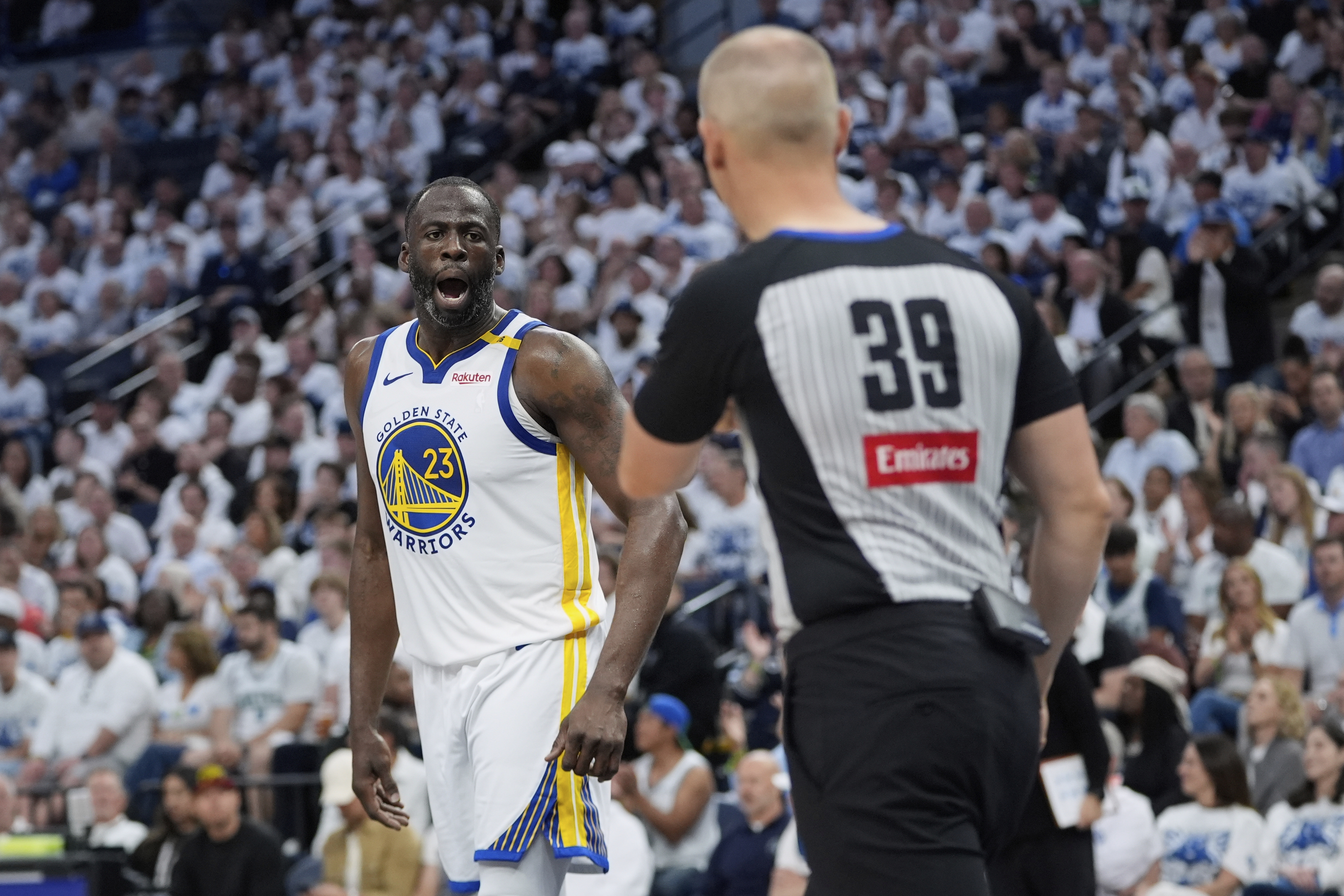 Golden State Warriors forward Draymond Green (23) reacts toward referee Tyler Ford during the second half of Game 2 of an NBA basketball second-round playoff series against the Minnesota Timberwolves, Thursday, May 8, 2025, in Minneapolis.