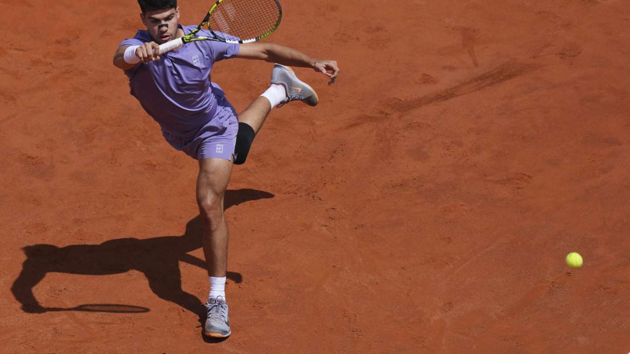 Spain's Carlos Alcaraz in action against Serbia's Dusan Lajovic during the Italian Open tennis tournament in Rome, Friday May 9, 2025.