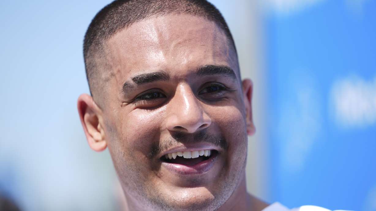 Detroit Lions defensive lineman Ahmed Hassanein smiles while talking with the media after the NFL football team's rookie minicamp in Allen Park, Mich., Friday, May 9, 2025.