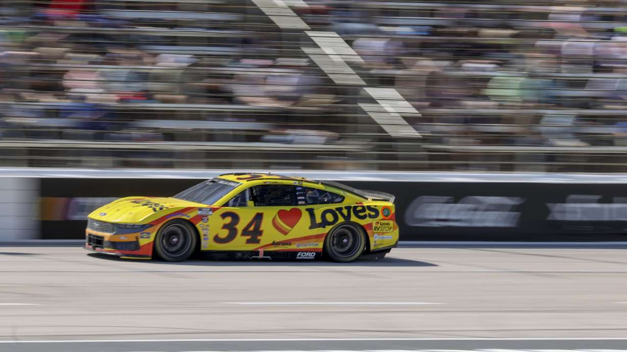 Todd Gilliland (34) leads the pack following a caution during a NASCAR Cup Series auto race at Texas Motor Speedway in Fort Worth, Texas, Sunday, May 4, 2025.