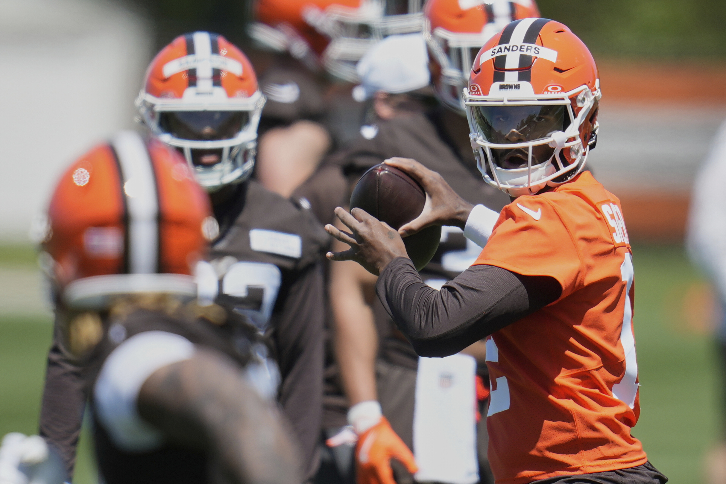 Cleveland Browns quarterback Shedeur Sanders throws during the NFL football team's rookie minicamp in Berea, Ohio, Friday, May 9, 2025.