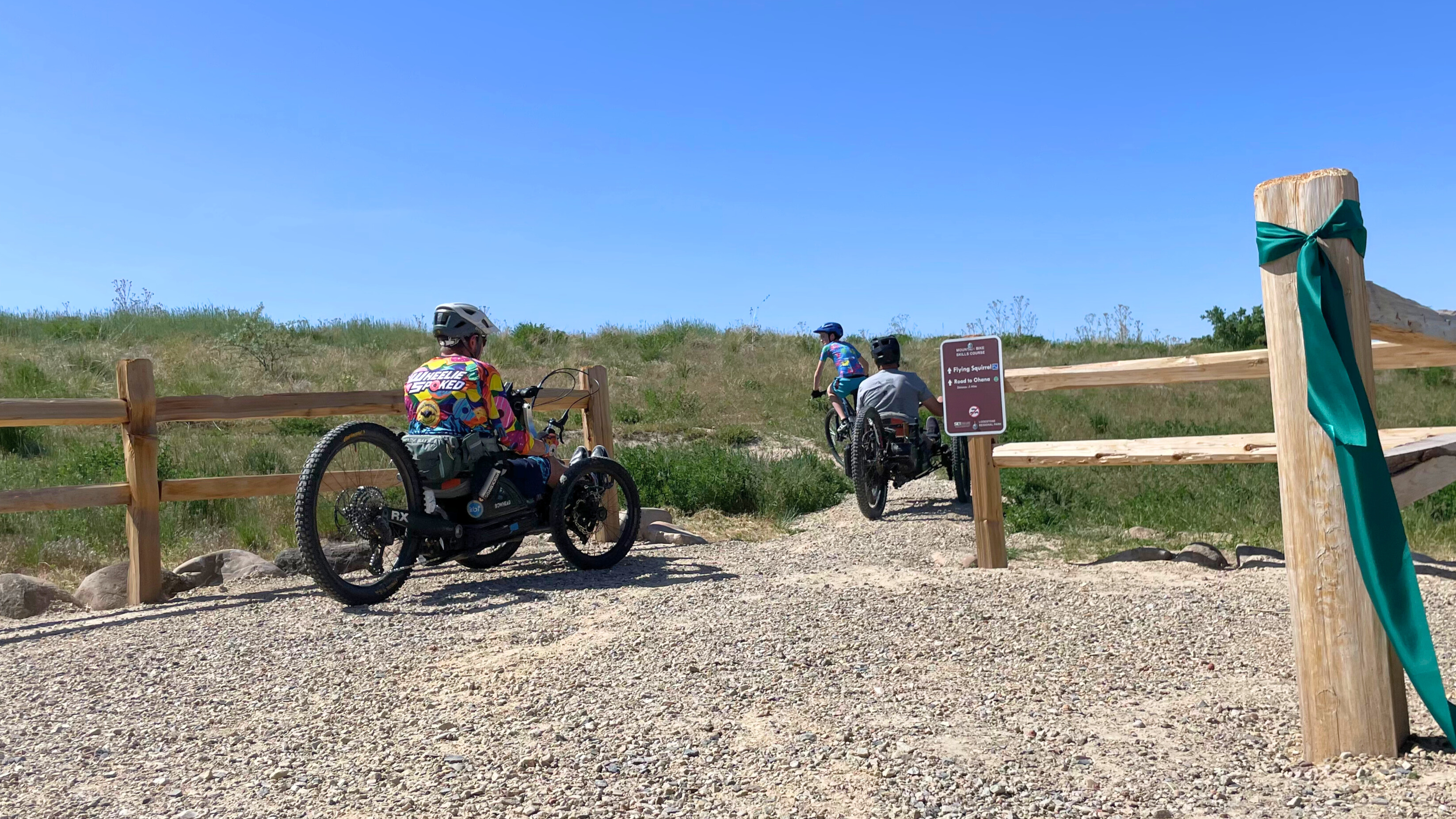 Mountain bike riders start at head of new accessible skills course trail at Lodestone Regional Park in West Valley City on Friday. The trail was designed to accommodate riders of all skill levels and bicycle types, including adaptive bikes like handcycles.