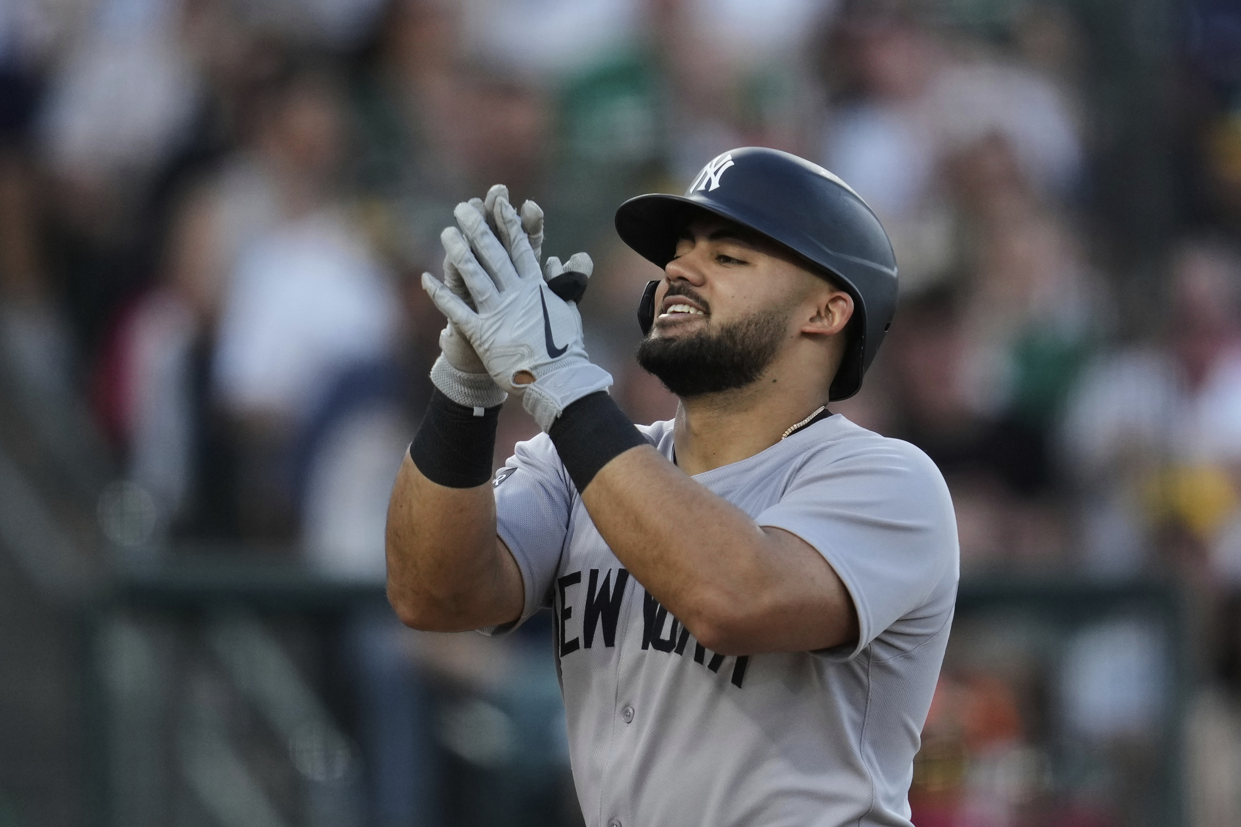 New York Yankees' Jasson Domínguez celebrates after hitting a solo home run during the third inning of a baseball game against the Athletics, Friday, May 9, 2025, in West Sacramento, Calif.
