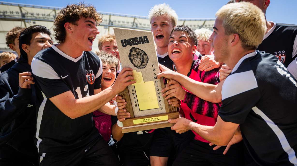 Ogden Tigers players celebrate after winning 2-1 against the Morgan Trojans in the 3A boys soccer state championship at America First Field in Sandy on Saturday, May 10, 2025.