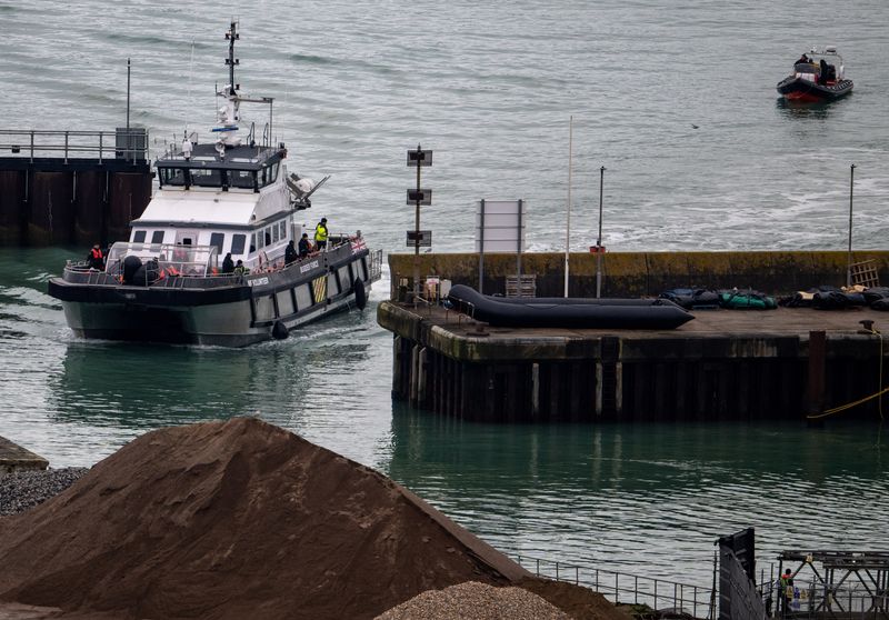 UK plans to end 'failed free market experiment' in immigration