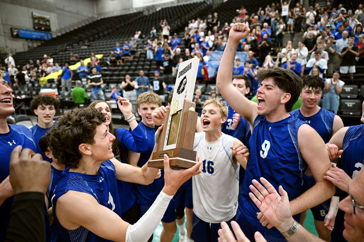 Bingham celebrates their win over Mountain Ridge for the 6A boys volleyball chamiopship in the UCCU Center at UVU in Orem on Saturday, May 10, 2025.