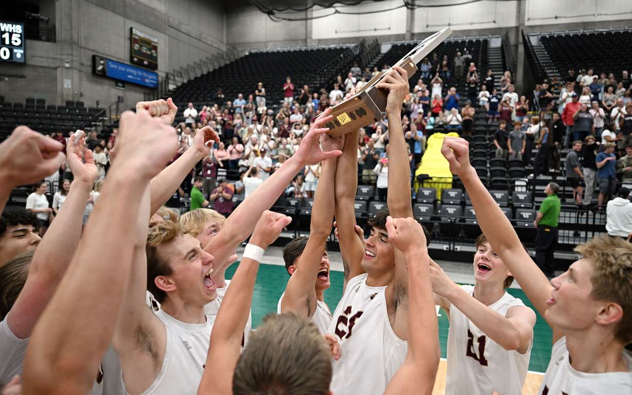 Maple Mountain celebrates their win over Wasatch for the 5A boys volleyball championship in the UCCU Center at UVU in Orem on Saturday, May 10, 2025.