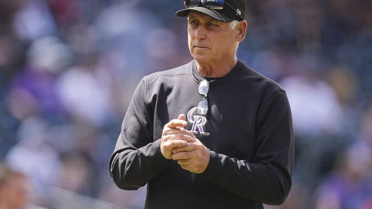 Colorado Rockies manager Bud Black waits for relief pitcher Jake Bird to take the mound after removing starting pitcher Chase Dollander in the sixth inning of a baseball game against the Atlanta Braves, Wednesday, April 30, 2025, in Denver.
