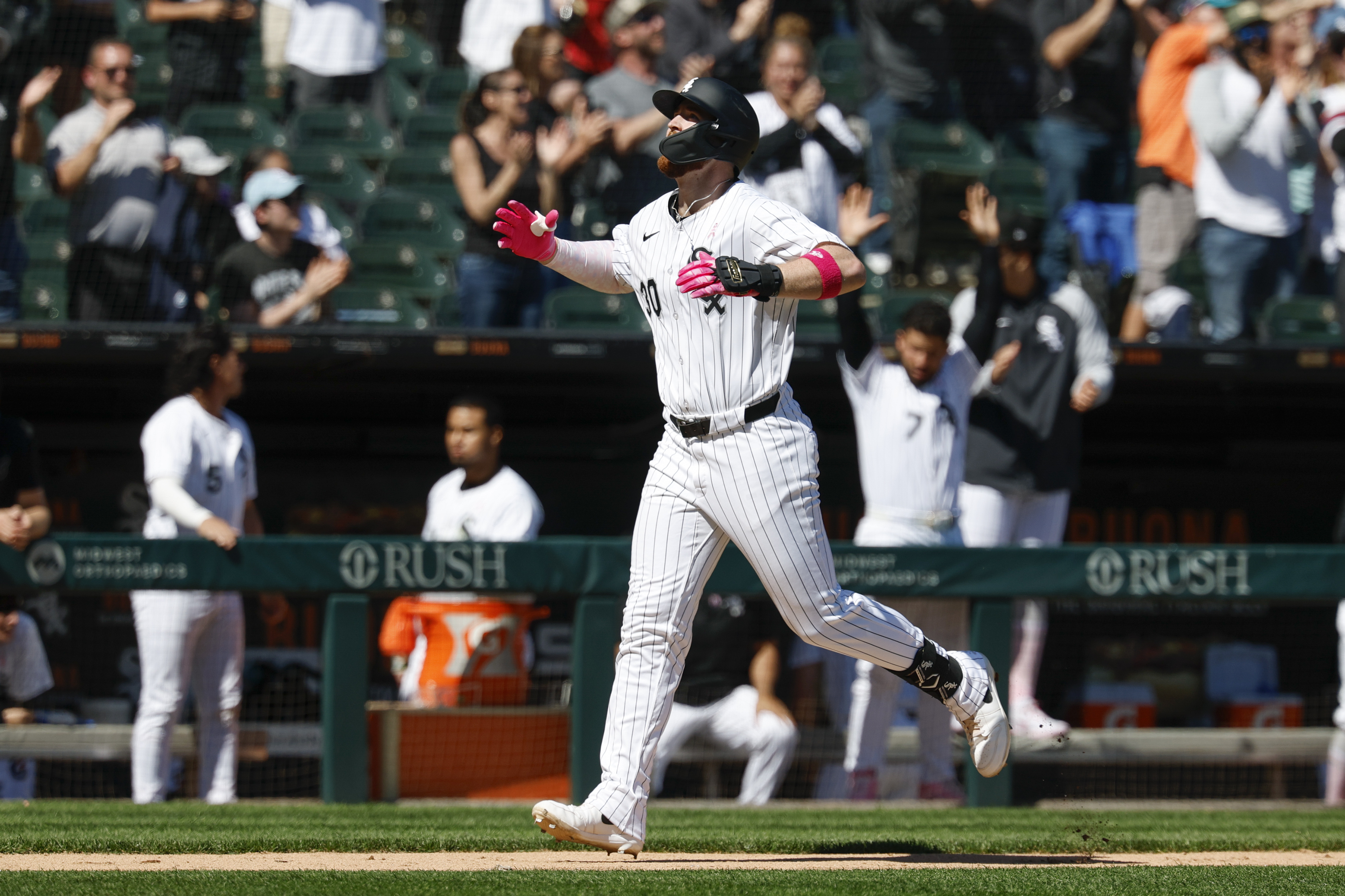 Chicago White Sox's Tim Elko rounds the bases after hitting a three-run home run against the Miami Marlins during the sixth inning of a baseball game Sunday, May 11, 2025, in Chicago.